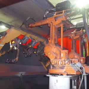 Due Robots ABB IRB1400  gemelli Flexarc M97A S4C con posizionatore MTB 750 IRBP 750K